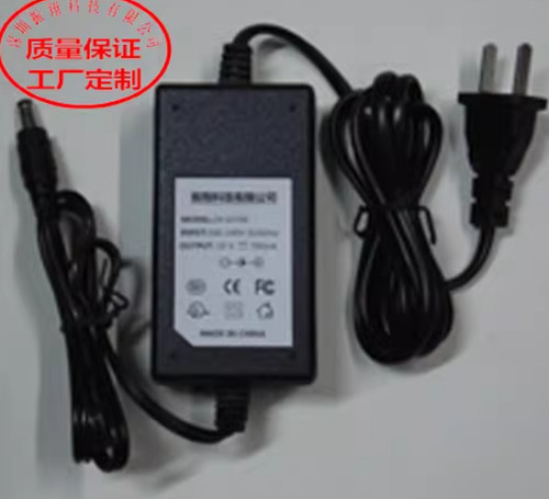 Alimentatore per adattatore