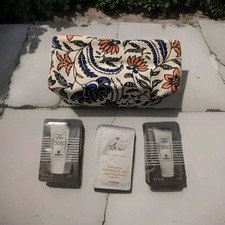 NUOVO Sisley lotto di 16 campioni autentici di crema/lozione per la cura della pelle con borsa per il trucco