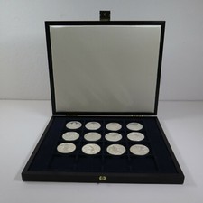 [R1024] 12x 10 Yuan Argento