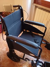 Sedia a rotelle pieghevole per