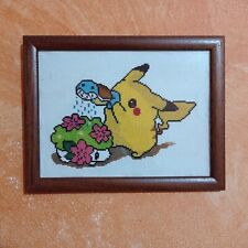 Quadro Pokémon ricamato a mano su tela con cornice. Misure 21x27