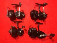 PÊCHE / LOT / 4 MOULINETS