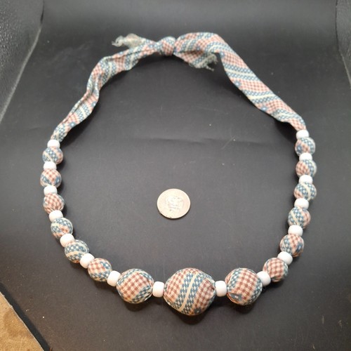 Collana perle tessuto - di,