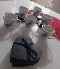 tazzine caffe con base in pietra color grigio scuro usate solo in occasioni.