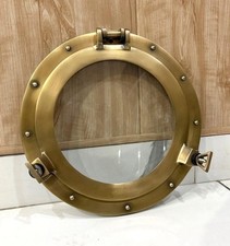 Oblò nautico antico in ottone