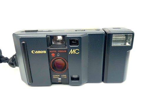 Canon point shoot con mm - 35,