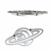 Spilla CHANEL motivo Saturno