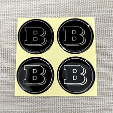 4 adesivi coprimozzo emblema