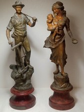 Due sculture in metallo su base lignea.  Francia prima metà '900