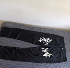 jeans uomo strappati