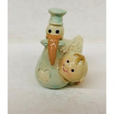 Cicogna con bambino in resina