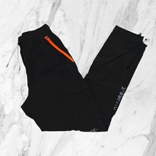 NIKE AIR MAX Pantaloni Uomo NUOVI Tech Utility Cargo Nylon Neri Zip Arancio Tg S