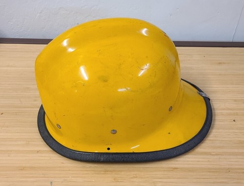 Casco pompiere giallo vintage