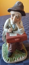 FIGURA VECCHIO SEDUTO CON