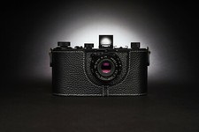 Custodia mezza fotocamera in