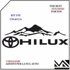 2 ADESIVI stickers SCRITTA HILUX LOGO TOYOTA CON MONTAGNE COLORE NERO