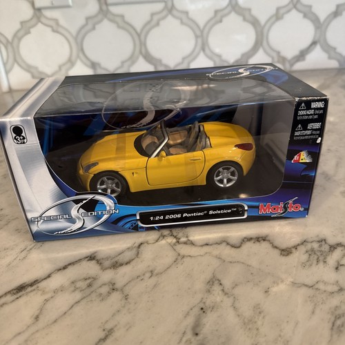 Maisto pontiac solstice yellow - maisto,