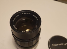 Obiettivo Olympus E. Zuiko Auto-T 1:35 F=135 con paraluce