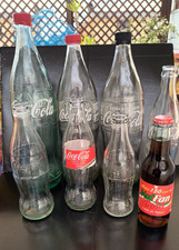 Bottiglie Coca-Cola n. 7 varie