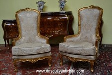 Coppia di poltrone dorate stile Barocco