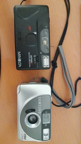 Due macchine fotografiche - due,