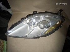 Faro proiettore anteriore SX