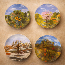Set di 4 piatti decorativi