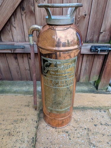 Antique brass guardian fire - brass,