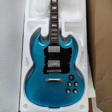 Chitarra elettrica blu metallizzato SG pickup HH tastiera palissandro hardware argento