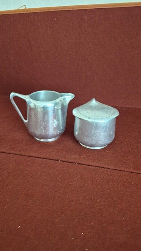 Picquot ware milk jug and - milk,
