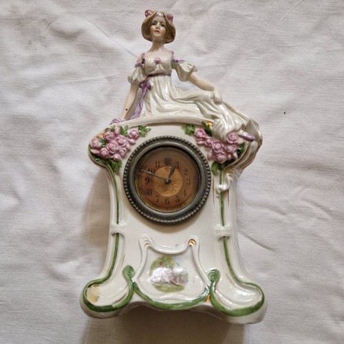 Antico orologio porcellana