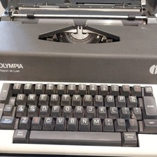Vintage 1975 Olympia Report de