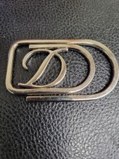 Fermasoldi S.T DUPONT. Tono