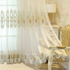 Tende trasparenti ricamate