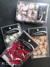 Roselline bomboniere che si incollano rosse, salmone avorio e rosa