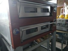 frigo nuovo e forno per pizzeria lavorato 2 anni dim.bocca 100x90 cm