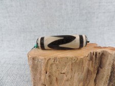 Amuleto totem dente di tigre