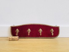 Antico appendiabiti con ganci