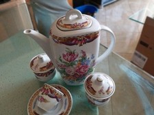 Servizio da caffe antico in porcellana Bavaria tazzine a fiori e oro x 12.