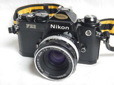 Nikon FE2 Camera + 50mm f2 Nikkor-H Auto Nikon lens SLR Black + Nikon Belt