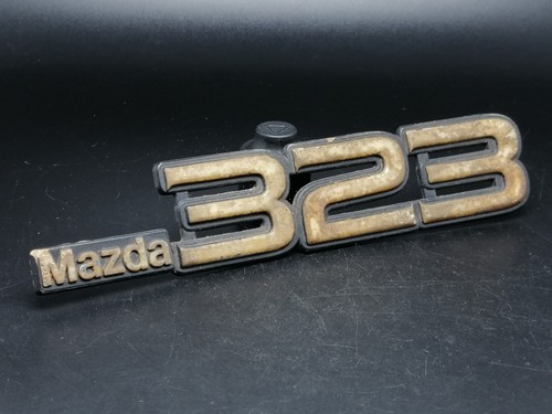 Mazda 323 logo sigla emblema - sigla,