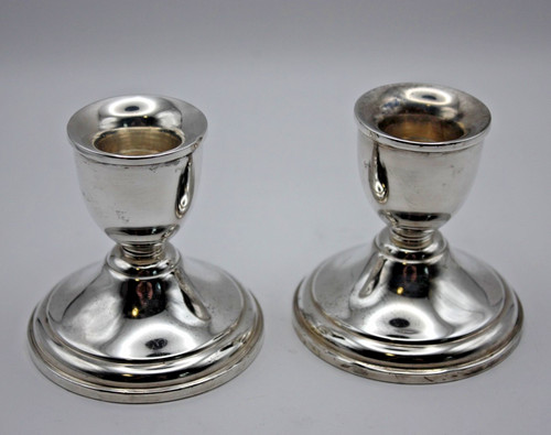 Coppia candelabri pesati - di,