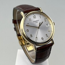 TISSOT Carson oro giallo 18