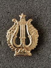FREGIO BERRETTO O CAPPELLO