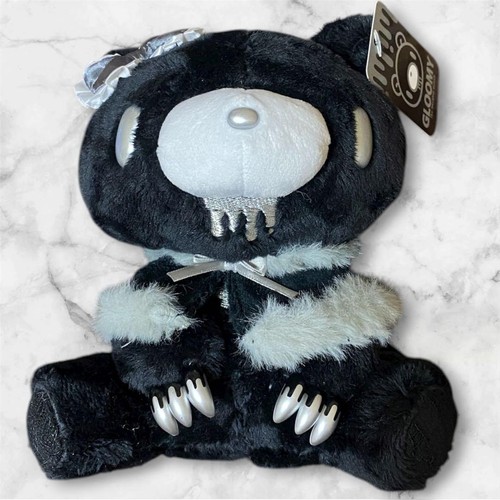 Peluche orso cupo - , seduta