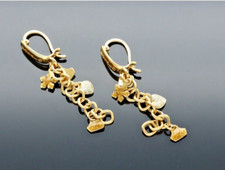 750/1000.18KT ROSE GOLD CHARM