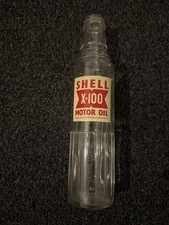 Shell X100 quart oil bottle
