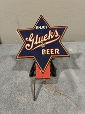 Gluek beer booth spinner - booth,