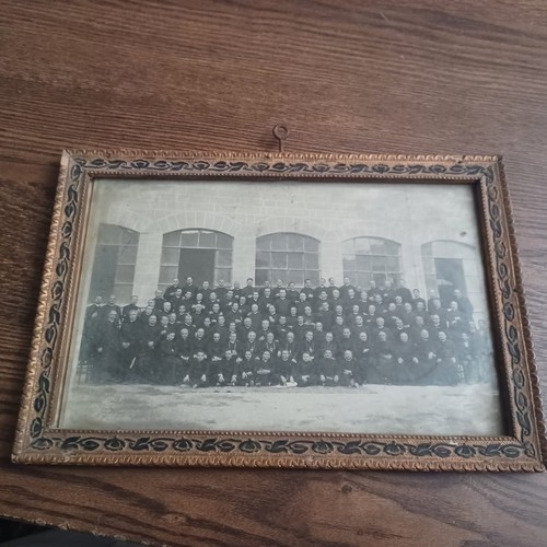 Antica cornice con foto primi