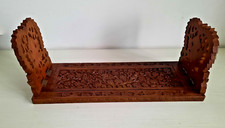 antica mensola con fermalibri